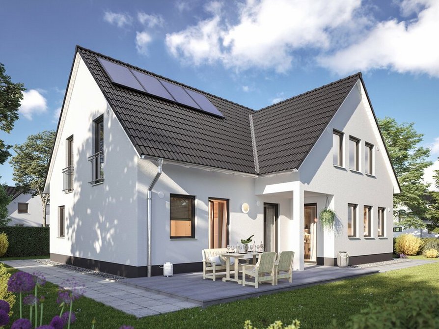 Das Domizil 192 in der Elegance Variante bietet einen malerischen Gartenblick von der Terrasse aus und präsentiert sich als Zweifamilienhaus